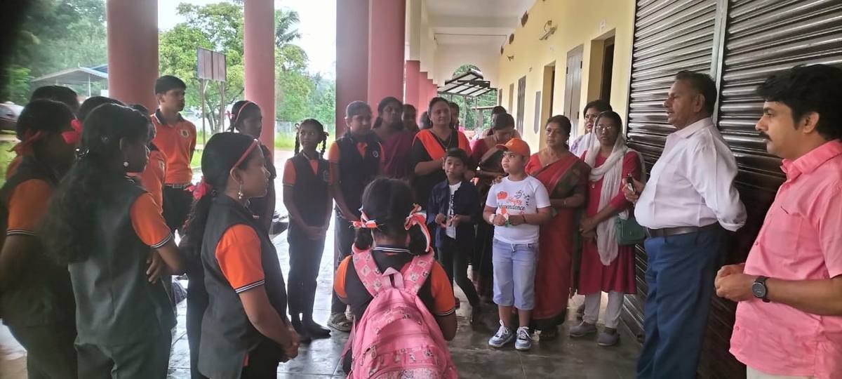 Pupils and staff gathered along the veranda for the Independence Day programme.