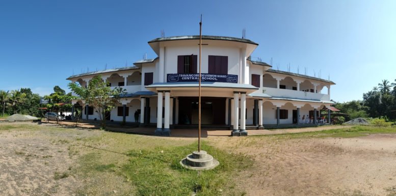 The school building at Thevarnada, with its name board and flagstaff.